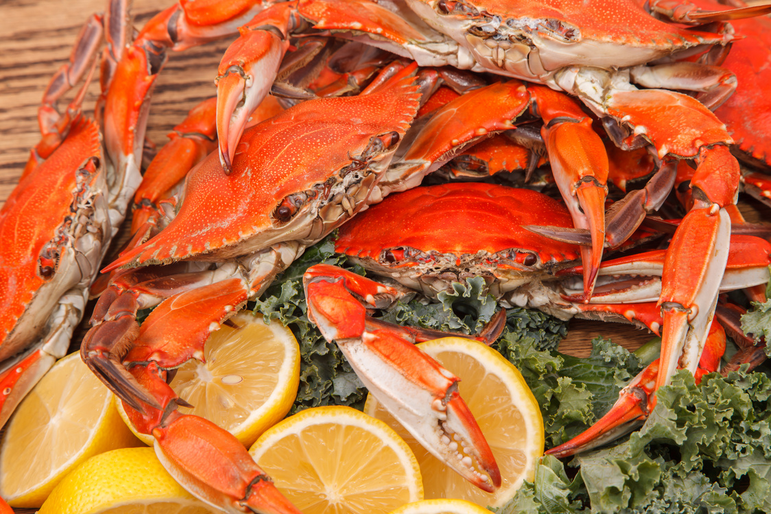 Steamed Blue Crabs on a wooden table